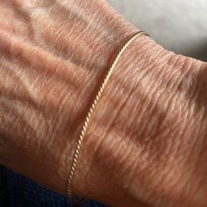 14 K gold bangle sz 7”